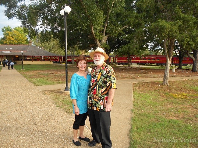Kim and the Nomadic Texan at the Texas State Railroad Entrance