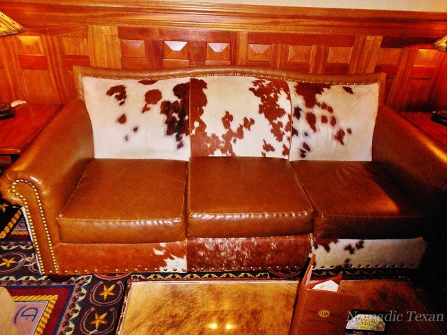 A Cowhide Couch in the Hallway